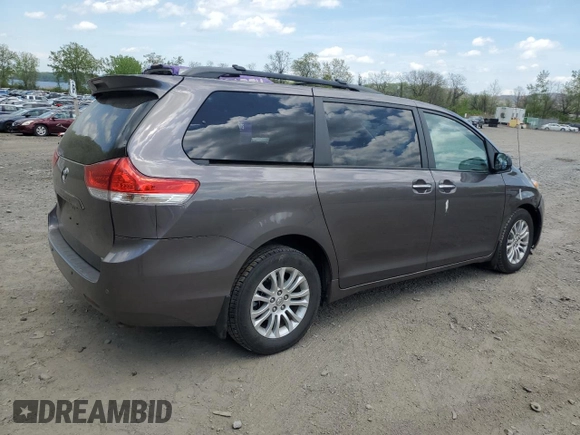 2012 Toyota Sienna XLE AAS with VIN 5TDYK3DC6CS248919, listed as a Copart auction lot 55470505 with 79,761 mi miles and Salvage title. Bid and sale history available at DreamBid. Image 3.