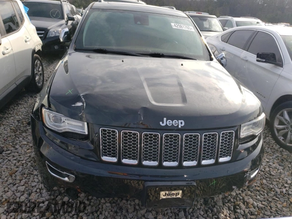 2015 Jeep Grand Cherokee Summit with VIN 1C4RJFJG0FC700014, listed as a Copart auction lot 42981765 with 144,937 mi miles and Salvage Title. Bid and sale history available at DreamBid. Image 5.