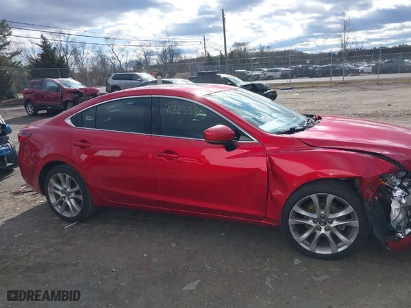 2017 Mazda Mazda6 Touring with VIN JM1GL1V53H1117304, listed as a IAAI auction lot 41723585 with 148,548 mi miles. Bid and sale history available at carsss.com. Image 13.
