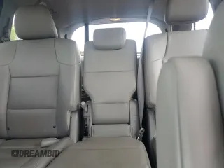 2014 Honda Odyssey EX-L with VIN 5FNRL5H63EB013483, listed as a Copart auction lot 63002435 with 127,059 mi miles and Salvage title. Bid and sale history available at DreamBid. Image 10.