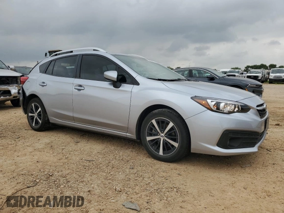 2023 Subaru Impreza Premium with VIN 4S3GTAD67P3713562, listed as a Copart auction lot 54821275 with 36,995 mi miles and Salvage title. Bid and sale history available at DreamBid. Image 4.