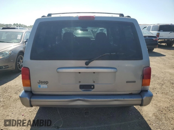 2001 Jeep Cherokee Sport z VIN 1J4FF58S61L540796, wystawiony jako Copart lot #62384895 z przebiegiem 209 294 mil mil oraz Czysty tytuł • Clean title. Historia ofert i sprzedaży dostępna na DreamBid. Obrazek 6.