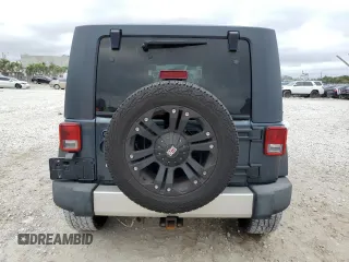 2007 Jeep Wrangler Unlimited X with VIN 1J8GA39107L105101, listed as a Copart auction lot 88559675 with 213,902 mi miles and Salvage title. Bid and sale history available at DreamBid. Image 6.