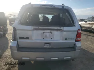 2012 Ford Escape Hybrid с VIN 1FMCU5K37CKA30865, выставлен на аукционе Copart как лот 79235264 с пробегом 140 112 миль миль и Списание • Salvage title. История ставок и продаж доступна на DreamBid. Изображение 6.