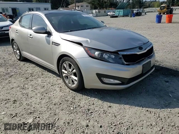 2011 Kia Optima EX z VIN KNAGN4A77B5096621, wystawiony jako Copart lot #53087945 z przebiegiem 189 899 mil mil oraz Szkoda całkowita • Salvage title. Historia ofert i sprzedaży dostępna na DreamBid. Obrazek 13.