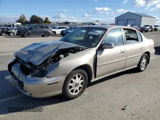 1999 Chevrolet Malibu LS with VIN 1G1NE52MXX6233064, listed as a Copart auction lot 78757824 with 123,166 mi miles and Salvage Title. Bid and sale history available at DreamBid. Image 1.