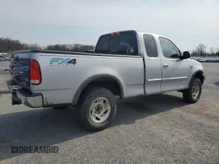 2003 Ford F-150 XL with VIN 1FTRX18L23NA66919, listed as a Copart auction lot 52911285 with 153,870 mi miles and Salvage Title. Bid and sale history available at carsss.com. Image 3.