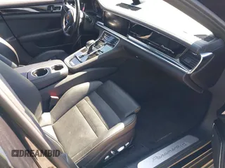 2020 Porsche Panamera 4 E-Hybrid z VIN WP0AE2A79LL132755, wystawiony jako IAAI lot #42040868 z przebiegiem 34 567 mil mil oraz . Historia ofert i sprzedaży dostępna na DreamBid. Obrazek 5.
