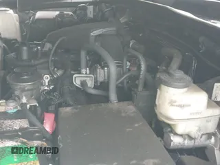 2018 Toyota Tacoma SR z VIN 5TFRX5GN7JX120324, wystawiony jako IAAI lot #42368906 z przebiegiem 142 521 mil mil oraz . Historia ofert i sprzedaży dostępna na DreamBid. Obrazek 19.