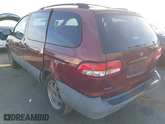 2002 Toyota Sienna CE with VIN 4T3ZF19C12U438162, listed as a IAAI auction lot 41725040 with 241,080 mi miles. Bid and sale history available at carsss.com. Image 3.
