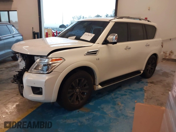 2019 Nissan Armada Platinum z VIN JN8AY2NF0K9352410, wystawiony jako IAAI lot #41078139 z przebiegiem 90 828 mil mil oraz . Historia ofert i sprzedaży dostępna na DreamBid. Obrazek 18.