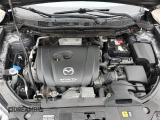 2016 Mazda CX-5 Grand Touring with VIN JM3KE4DY6G0834583, listed as a Copart auction lot 52015905 with 184,741 mi miles and Salvage Title. Bid and sale history available at DreamBid. Image 12.