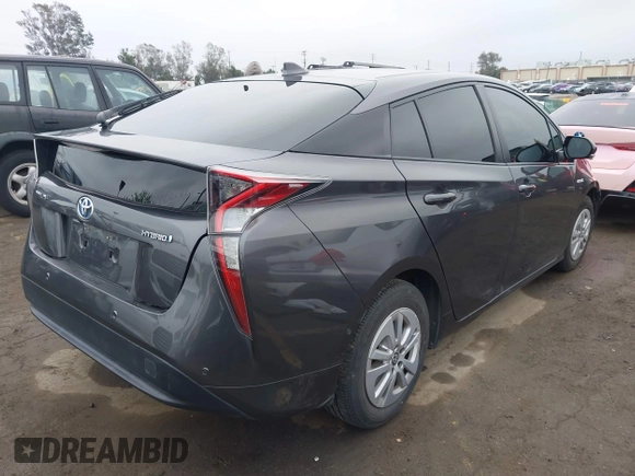 2018 Toyota Prius Two with VIN JTDKBRFUXJ3591956, listed as a IAAI auction lot 41848336 with 62,560 mi miles and . Bid and sale history available at DreamBid. Image 4.