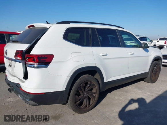 2022 Volkswagen Atlas SE z VIN 1V2WR2CA1NC519384, wystawiony jako IAAI lot #40548286 z przebiegiem 37 093 mil mil oraz . Historia ofert i sprzedaży dostępna na DreamBid. Obrazek 13.