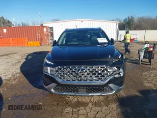 2022 Hyundai Santa Fe SEL with VIN 5NMS24AJXNH375497, listed as a IAAI auction lot 41390349 with 77,067 mi miles and . Bid and sale history available at DreamBid. Image 12.