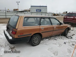 1989 Toyota Camry z VIN JT2SV21W5K0240987, wystawiony jako Copart lot #42248385 z przebiegiem 246 651 mil mil oraz Czysty tytuł • Clean title. Historia ofert i sprzedaży dostępna na DreamBid. Obrazek 3.