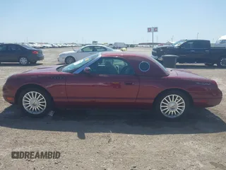 2004 Ford Thunderbird Deluxe with VIN 1FAHP60A34Y110452, listed as a IAAI auction lot 41847184 with 121,161 mi miles. Bid and sale history available at carsss.com. Image 14.