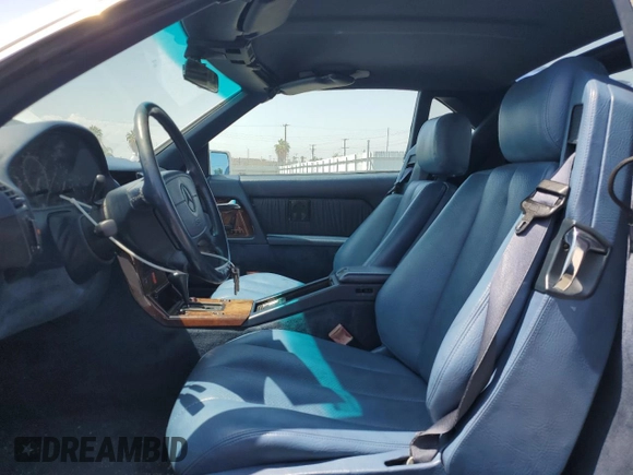 1994 Mercedes-Benz SL with VIN WDBFA63E8RF100874, listed as a Copart auction lot 59604935 with 146,006 mi miles and Salvage title. Bid and sale history available at DreamBid. Image 7.