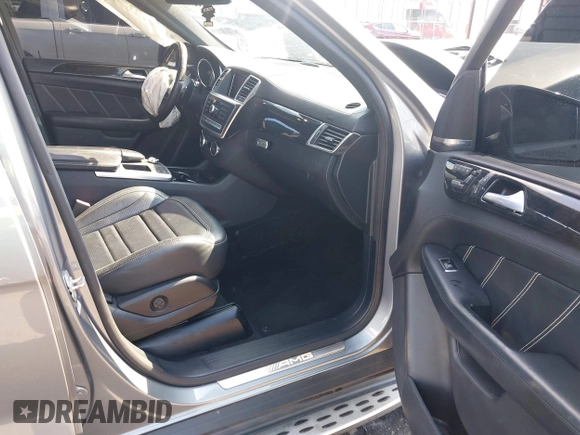 2013 Mercedes-Benz M ML 63 AMG with VIN 4JGDA7EB9DA155725, listed as a IAAI auction lot 41502675 with 64,849 mi miles. Bid and sale history available at carsss.com. Image 5.