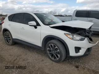 2016 Mazda CX-5 Grand Touring with VIN JM3KE2DYXG0784971, listed as a Copart auction lot 43865605 with 146,025 mi miles and Salvage Title. Bid and sale history available at carsss.com. Image 4.