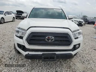 2023 Toyota Tacoma SR5 z VIN 3TMAZ5CN2PM209813, wystawiony jako Copart lot #53946645 z przebiegiem 23 411 mil mil oraz Szkody całkowita. Historia ofert i sprzedaży dostępna na DreamBid. Obrazek 5.