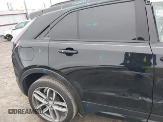 2019 Cadillac XT4 FWD Sport z VIN 1GYFZER49KF178096, wystawiony jako IAAI lot #41611247 z przebiegiem 37 971 mil mil oraz . Historia ofert i sprzedaży dostępna na DreamBid. Obrazek 19.