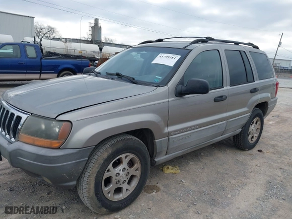 1999 Jeep Grand Cherokee Laredo with VIN 1J4GW58N4XC676836, listed as a IAAI auction lot 41799381 with 203,784 mi miles. Bid and sale history available at carsss.com. Image 2.