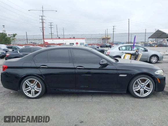 2015 BMW 5 Series 535i with VIN WBA5B1C55FG128387, listed as a IAAI auction lot 41885806 with 94,734 mi miles and . Bid and sale history available at carsss.com. Image 13.