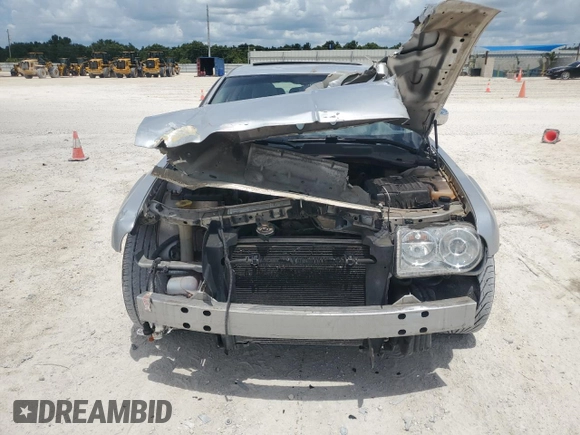 2006 Chrysler 300 C with VIN 2C3LA63H86H319542, listed as a Copart auction lot 63530194 with 167,288 mi miles and Salvage Title. Bid and sale history available at carsss.com. Image 5.