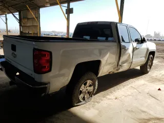 2017 Chevrolet Silverado 1500 LT with VIN 1GCRCREC0HZ387694, listed as a Copart auction lot 52417595 with 154,054 mi miles and Salvage Title. Bid and sale history available at DreamBid. Image 3.