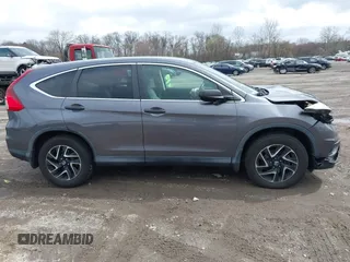 2016 Honda CR-V SE with VIN 2HKRM4H47GH670877, listed as a IAAI auction lot 41952201 with 152,394 mi miles and . Bid and sale history available at carsss.com. Image 12.
