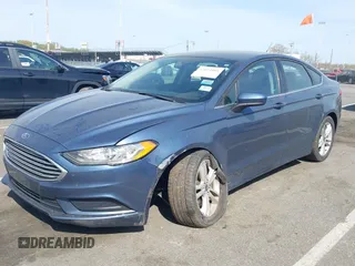 2018 Ford Fusion SE z VIN 3FA6P0H74JR176113, wystawiony jako IAAI lot #42074916 z przebiegiem 78 940 mil mil oraz . Historia ofert i sprzedaży dostępna na DreamBid. Obrazek 6.