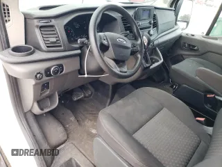 2023 Ford Transit Cargo with VIN 1FTBR1Y83PKA29926, listed as a Copart auction lot 83096634 with 22,496 mi miles and Clean Title. Bid and sale history available at DreamBid. Image 8.