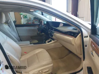 2013 Lexus ES 300h Hybrid with VIN JTHBW1GG4D2036539, listed as a IAAI auction lot 42121701 with 157,855 mi miles. Bid and sale history available at carsss.com. Image 5.