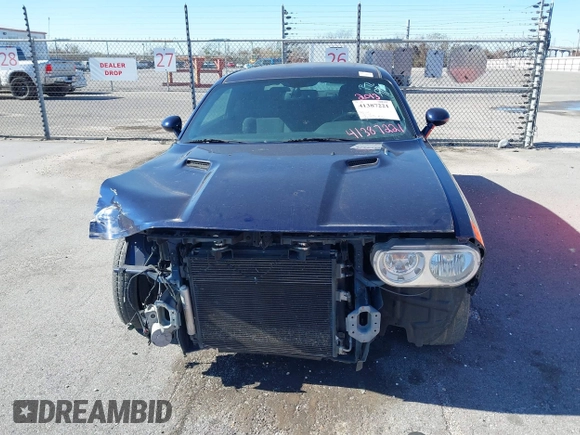 2013 Dodge Challenger R/T z VIN 2C3CDYBT7DH679522, wystawiony jako IAAI lot #41387221 z przebiegiem 122 147 mil mil oraz . Historia ofert i sprzedaży dostępna na DreamBid. Obrazek 12.
