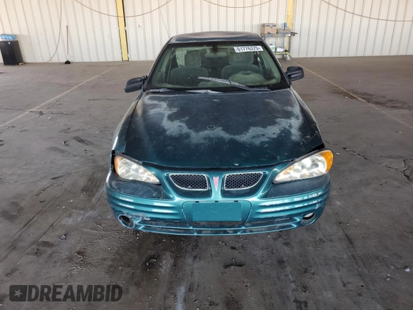 1999 Pontiac Grand Am SE with VIN 1G2NE52T1XC572008, listed as a Copart auction lot 61776375 with Not provided miles and Clean title. Bid and sale history available at DreamBid. Image 5.