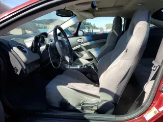 2006 Mitsubishi Eclipse GS with VIN 4A3AK24F26E038086, listed as a Copart auction lot 76982394 with 168,590 mi miles and Salvage Title. Bid and sale history available at carsss.com. Image 7.