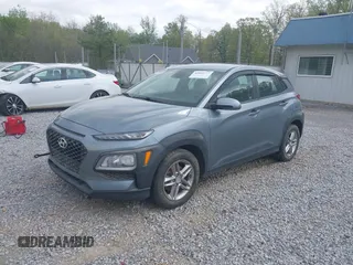 2019 Hyundai Kona SE with VIN KM8K12AA0KU257384, listed as a IAAI auction lot 42049777 with 91,000 mi miles. Bid and sale history available at carsss.com. Image 2.