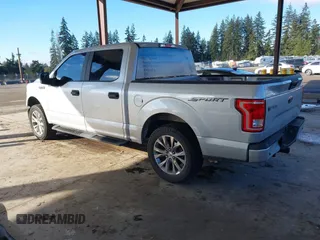 2015 Ford F-150 XLT with VIN 1FTEW1C86FKE85267, listed as a IAAI auction lot 41527996 with 119,800 mi miles and . Bid and sale history available at carsss.com. Image 3.
