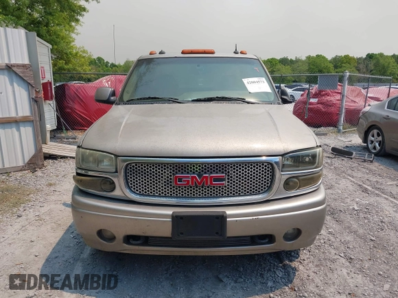 2003 GMC Sierra Denali z VIN 2GTFK69U531270072, wystawiony jako IAAI lot #42004573 z przebiegiem 240 244 mil mil oraz . Historia ofert i sprzedaży dostępna na DreamBid. Obrazek 13.