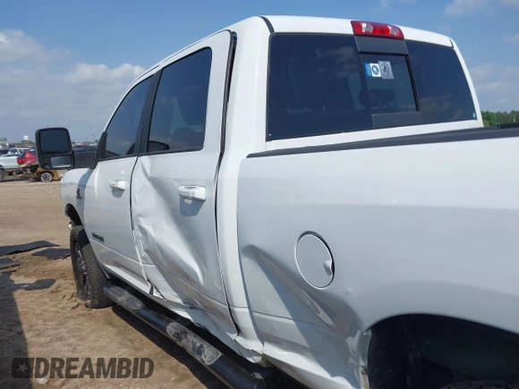 2023 Ram 2500 Laramie with VIN 3C6UR5FL3PG517960, listed as a IAAI auction lot 42128355 with 101,733 mi miles and . Bid and sale history available at DreamBid. Image 14.