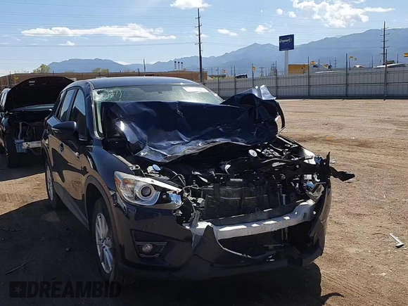 2016 Mazda CX-5 Touring z VIN JM3KE4CY8G0758947, wystawiony jako Copart lot #53140005 z przebiegiem 47 172 mil mil oraz Szkoda całkowita • Salvage title. Historia ofert i sprzedaży dostępna na DreamBid. Obrazek 12.