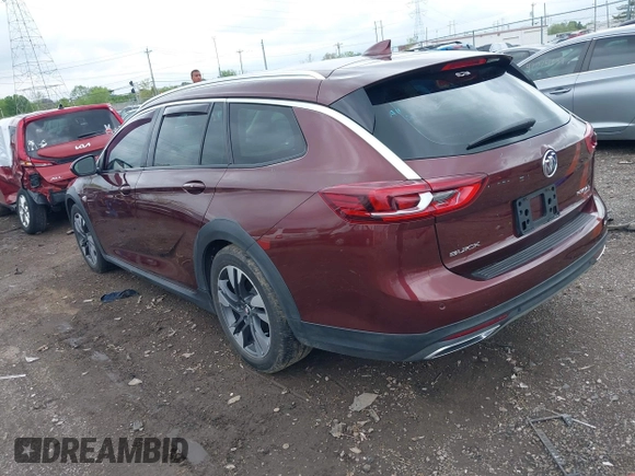 2018 Buick Regal Essence with VIN W04GV8SXXJ1122153, listed as a IAAI auction lot 42112879 with 70,408 mi miles and . Bid and sale history available at DreamBid. Image 3.