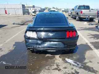 2015 Ford Mustang EcoBoost z VIN 1FA6P8TH4F5377048, wystawiony jako IAAI lot #42234256 z przebiegiem 160 455 mil mil oraz . Historia ofert i sprzedaży dostępna na DreamBid. Obrazek 19.
