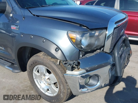 2010 Toyota Tundra with VIN 5TFEY5F11AX097360, listed as a IAAI auction lot 41990256 with 350,830 mi miles and . Bid and sale history available at DreamBid. Image 17.