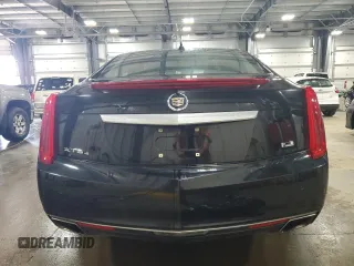 2014 Cadillac XTS Luxury z VIN 2G61N5S35E9133430, wystawiony jako Copart lot #54746235 z przebiegiem 157 544 mil mil oraz Szkoda całkowita • Salvage title. Historia ofert i sprzedaży dostępna na DreamBid. Obrazek 6.