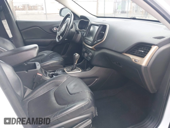 2014 Jeep Cherokee Limited with VIN 1C4PJLDS1EW217649, listed as a IAAI auction lot 41934101 with 135,781 mi miles. Bid and sale history available at carsss.com. Image 5.