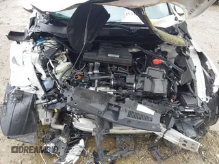 2018 Honda CR-V Touring z VIN 5J6RW1H96JL014087, wystawiony jako IAAI lot #41931640 z przebiegiem Nie podano mil oraz . Historia ofert i sprzedaży dostępna na DreamBid. Obrazek 10.
