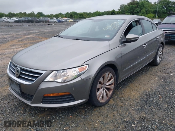 2012 Volkswagen CC R-Line z VIN WVWMP7AN2CE503052, wystawiony jako IAAI lot #42521596 z przebiegiem 136 930 mil mil oraz . Historia ofert i sprzedaży dostępna na DreamBid. Obrazek 2.