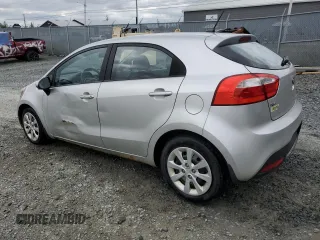 2013 Kia Rio LX with VIN KNADM5A38D6851068, listed as a Copart auction lot 74433694 with 258,009 mi miles and Clean Title. Bid and sale history available at DreamBid. Image 2.